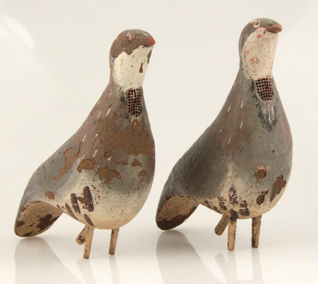 A pair of French partridge decoys painted