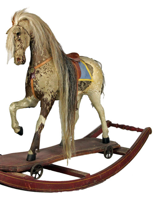 A hide covered rocking horse probably