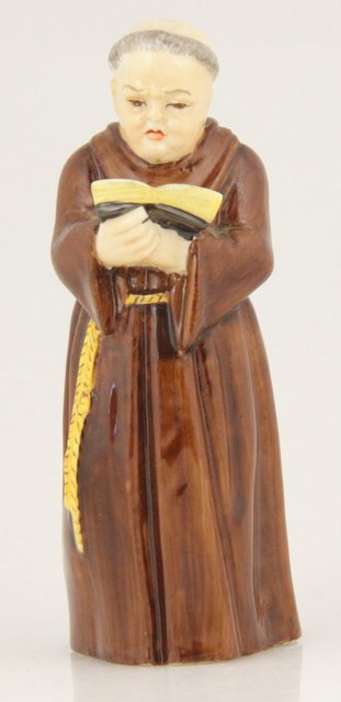 A Royal Worcester candle snuffer Monk