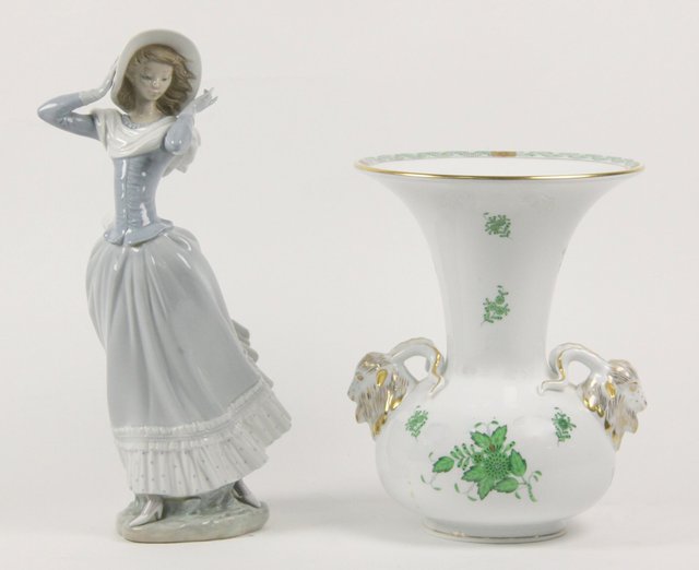 A Lladro figure of a young lady