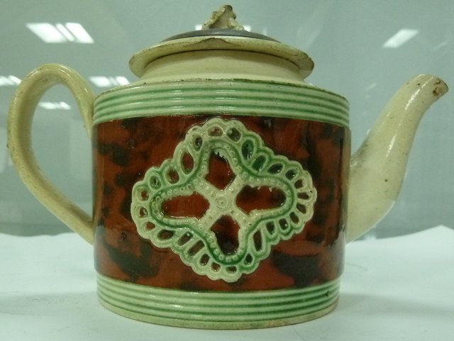 A Whieldon type teapot and cover