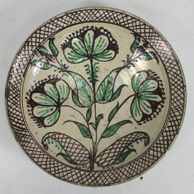A pottery bowl painted in the Isnik