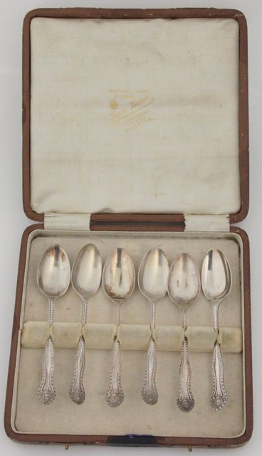 A boxed set of six silver teaspoons