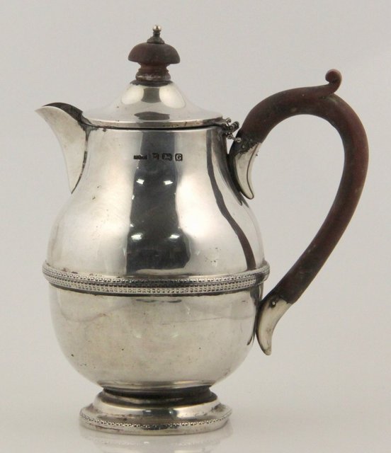 A silver hot water jug Birmingham