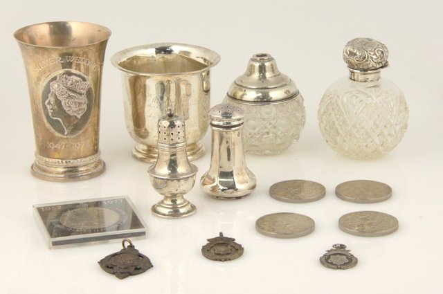 A silver commemorative beaker for