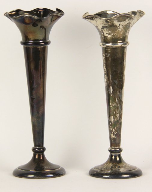 A large pair of silver spill vases