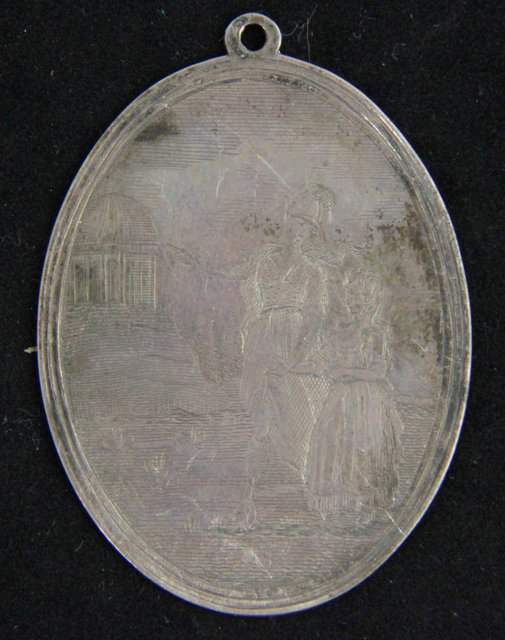 An oval medallion etched two figures 164925