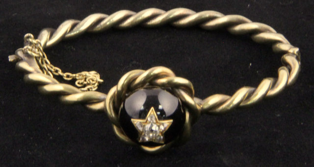 A hinged gem-set bracelet of ropetwist