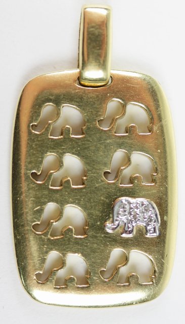 A diamond set 18ct yellow gold elephant