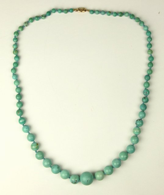 A graduated turquoise bead necklace