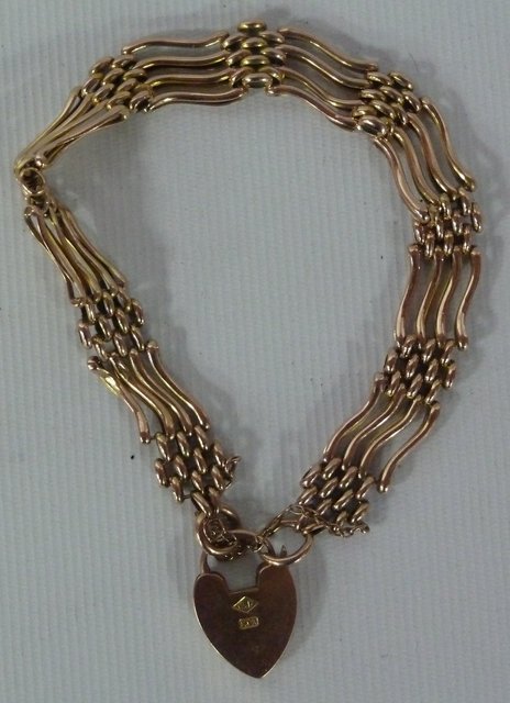 A 9ct gold fancy link bracelet with