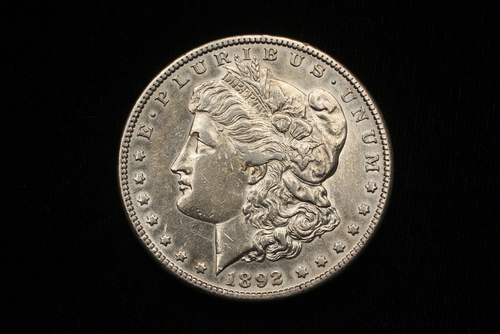 COIN - (1) Morgan silver dollar 1892S