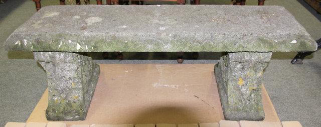 A composition stone seat on leaf