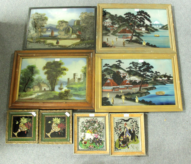 A collection of eight glass pictures