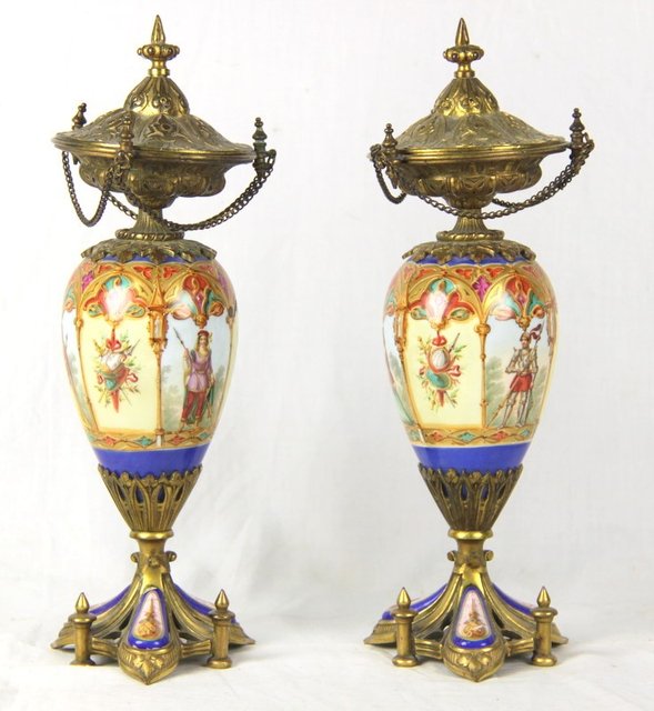 A pair of ormolu mounted porcelain