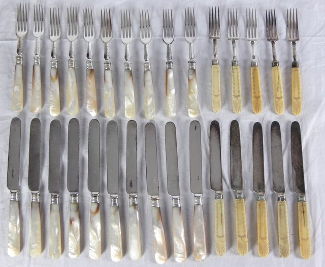 Ten pairs of dessert knives and forks