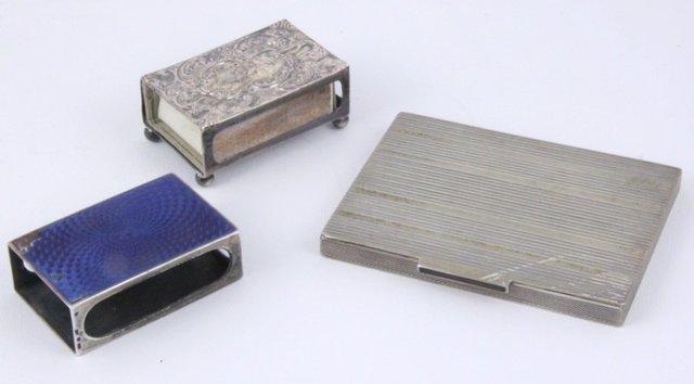 An embossed silver matchbox holder 165552