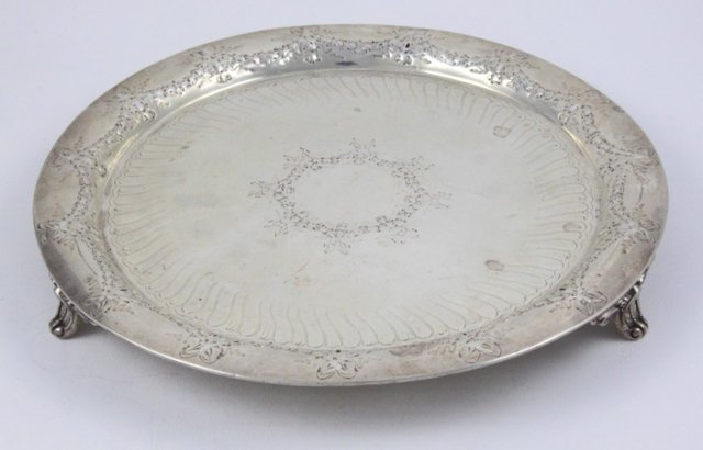 A circular silver salver Henry