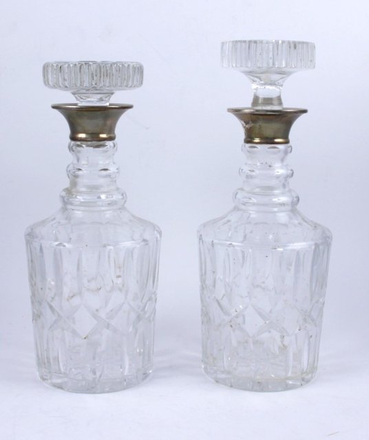 A pair of silver collared cut glass 16556a