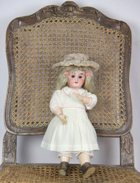 A Leconte & Co bisque head doll impressed