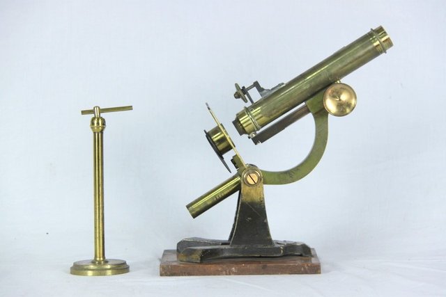 A brass microscope by J and C Robbins