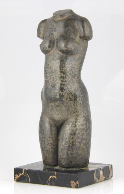 A cast torso of a nude circa 1950s monogrammed