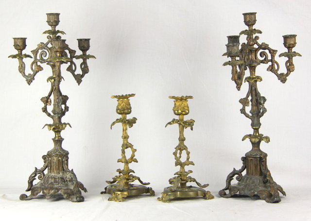 A pair of gilt and patinated metal