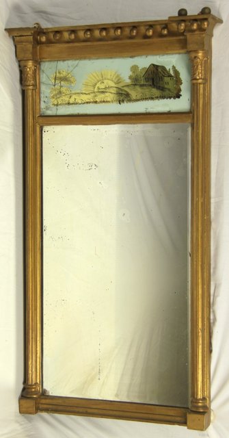 A mirror with verre ?glomis? frame 82.5cm