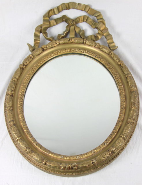 A plaster gilt oval mirror circa 1655f0