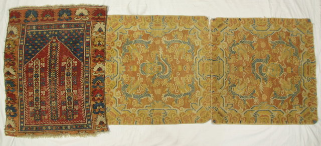 A pair of Oriental mats with stylised
