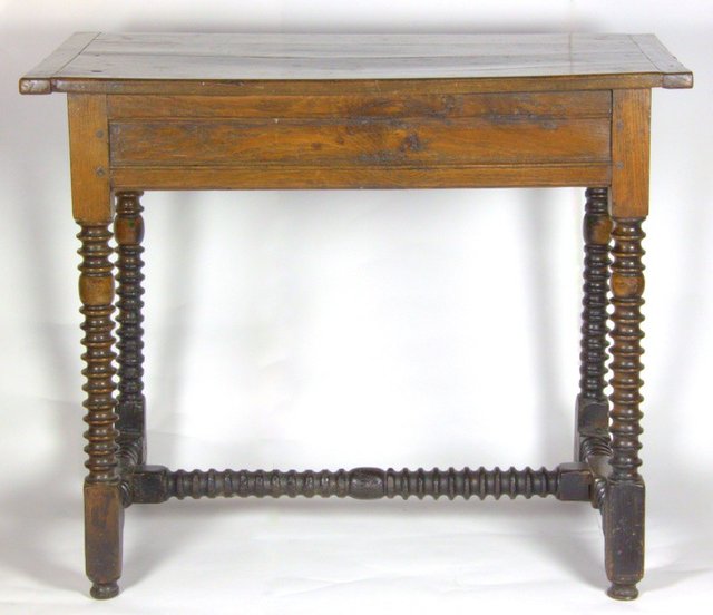 An oak side table of 17th Century