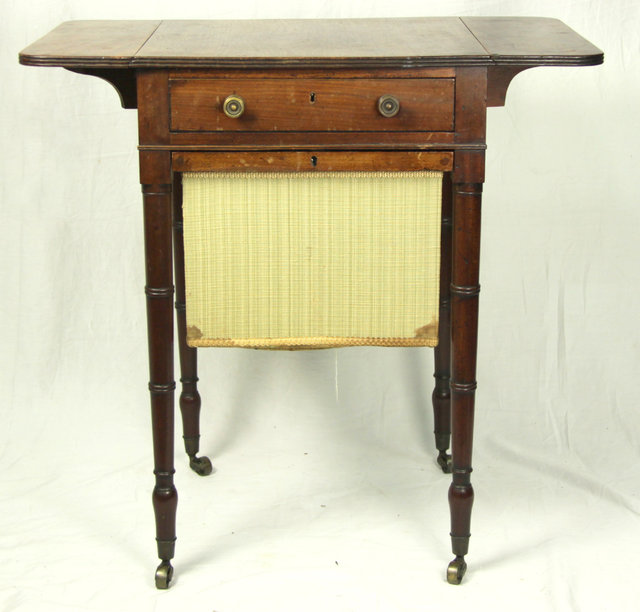 A 19th Century mahogany work table with