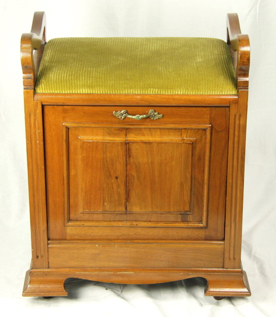 An Edwardian piano stool with music
