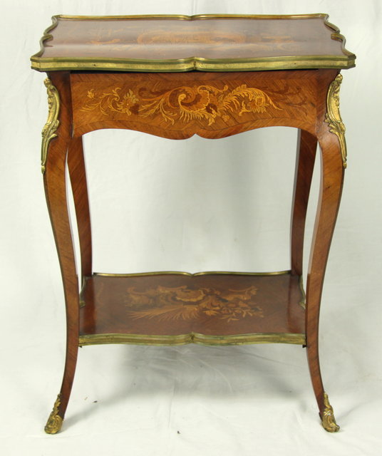 A small Louis XV style table circa 165618