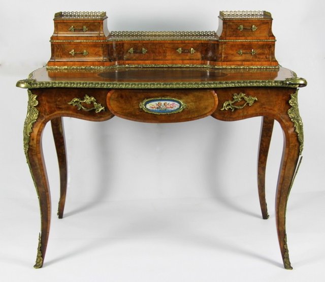 A Louis XV style walnut bureau-de-dame