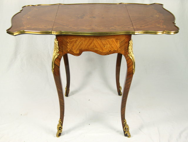 A Louis XV style Pembroke table