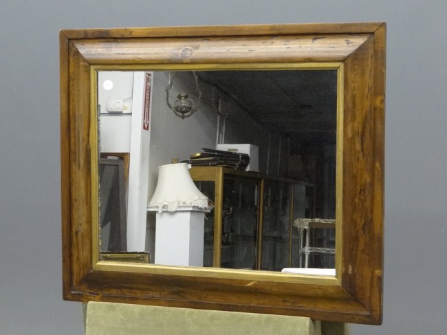 19th c. ogee mirror. 29'' x 34''.