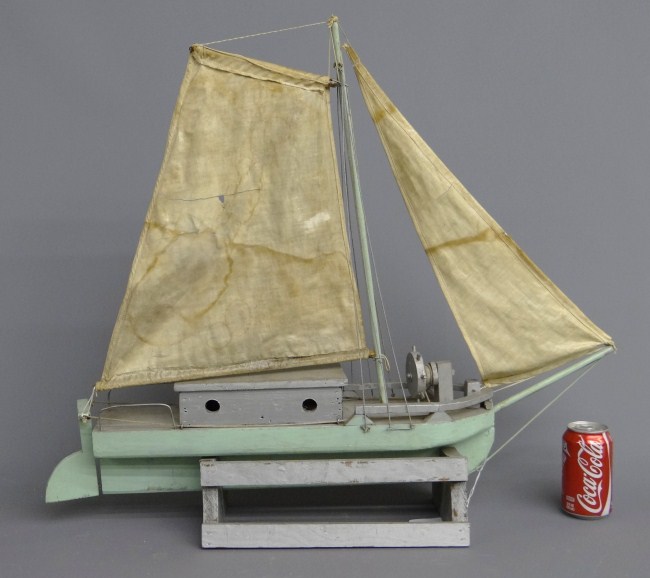 Early folk art painted ship model. 32