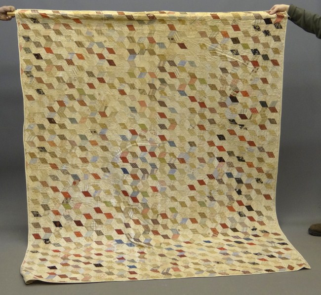 19th c. tumbling blocks quilt.