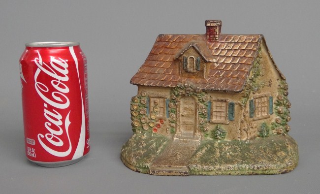 Vintage painted house doorstop.