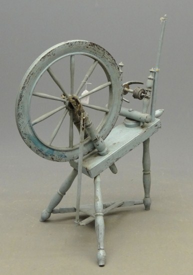19th c. spinning wheel in blue paint.