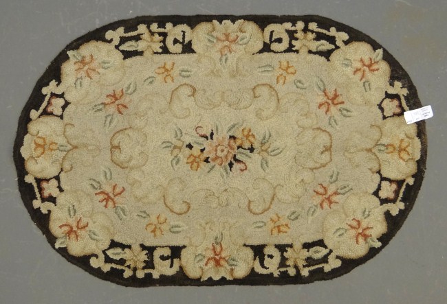 Floral hooked rug  167fea