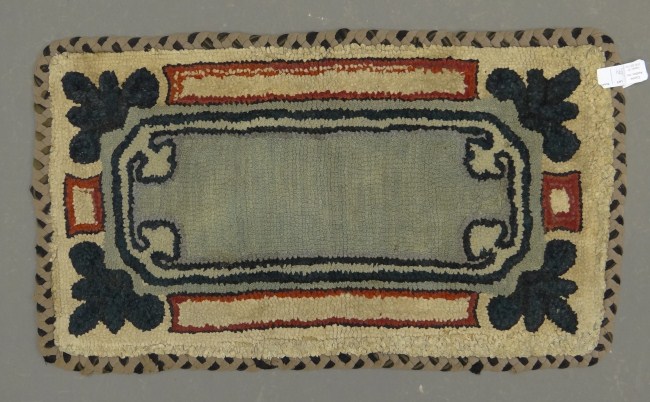 Early geometric hooked rug  167ff3