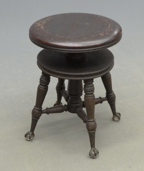 Victorian revolving piano stool.