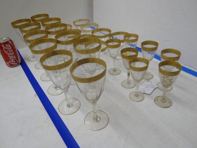 Lot 26 pcs. gold rim glasses.