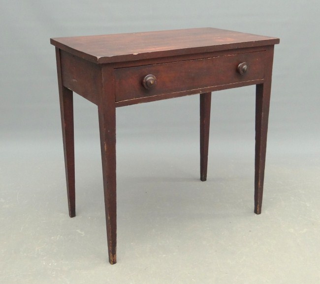 19th c. tapered leg table in old finish.