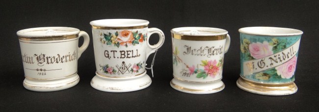 Lot four painted shaving mugs all with