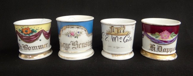 Lot four painted shaving mugs with