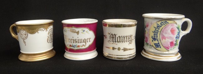 Lot four painted shaving mugs with