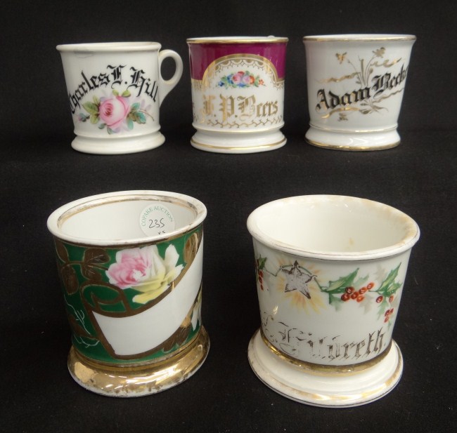 Lot five painted shaving mugs with